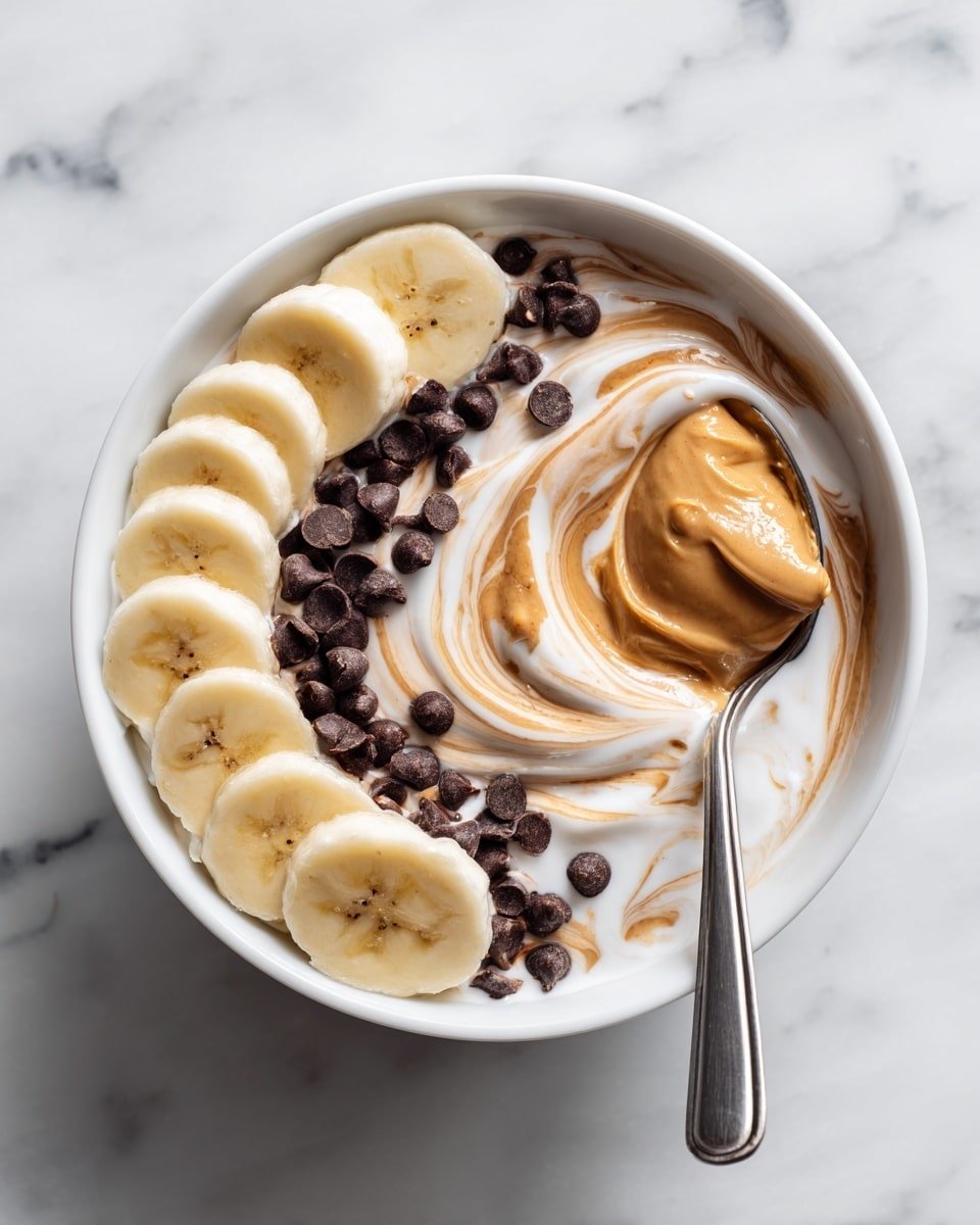 Dreamy Peanut Butter Yogurt Bowl Recipe - Recipe Image — Dreamy Peanut Butter Yogurt Bowl, healthy breakfast bowl, protein-packed yogurt snack, creamy peanut butter yogurt, quick wholesome breakfast