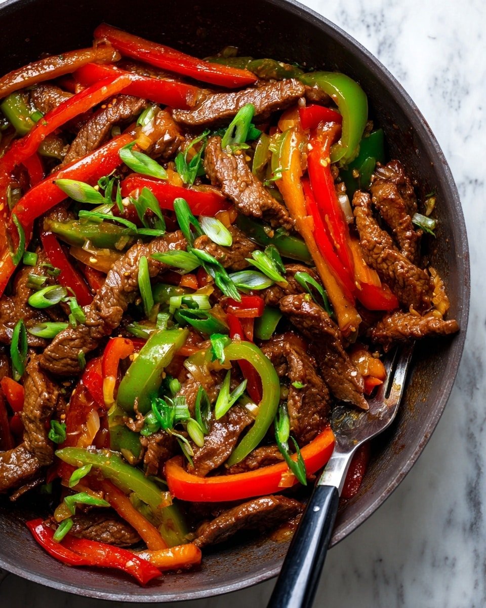 Easy Pepper Steak Recipe - Recipe Image — Easy Pepper Steak, quick stir-fry recipes, beef and bell peppers, easy weeknight dinner, savory steak dishes